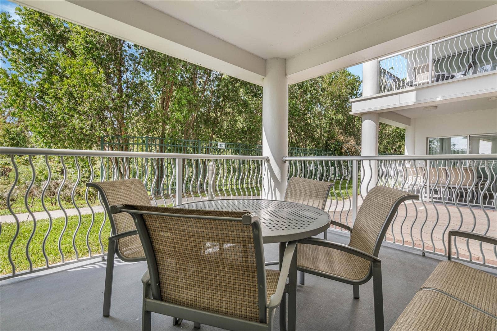 225 CELEBRATION PLACE, #117, Celebration, FL 34747 Patio by Primary Bedroom