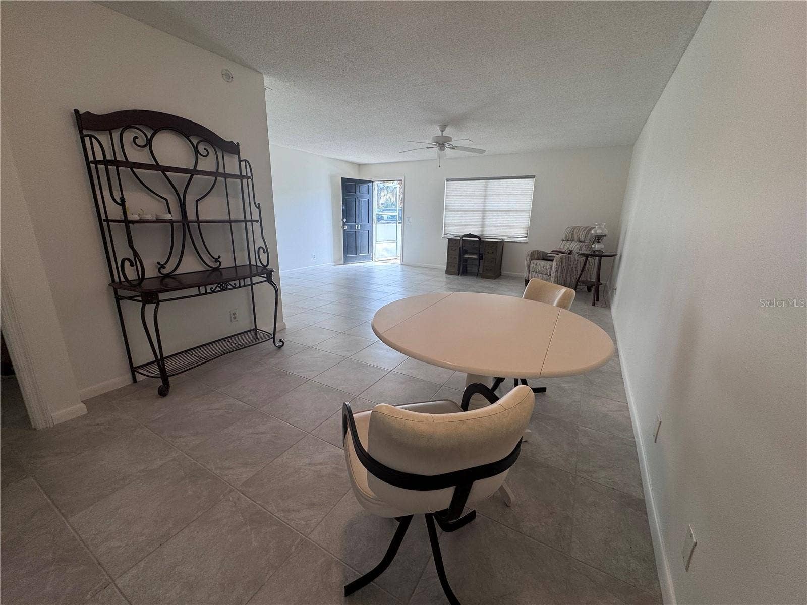 100 EL CAMINO DRIVE, #111, Winter Haven, FL 33884 Dining Room and Living Room