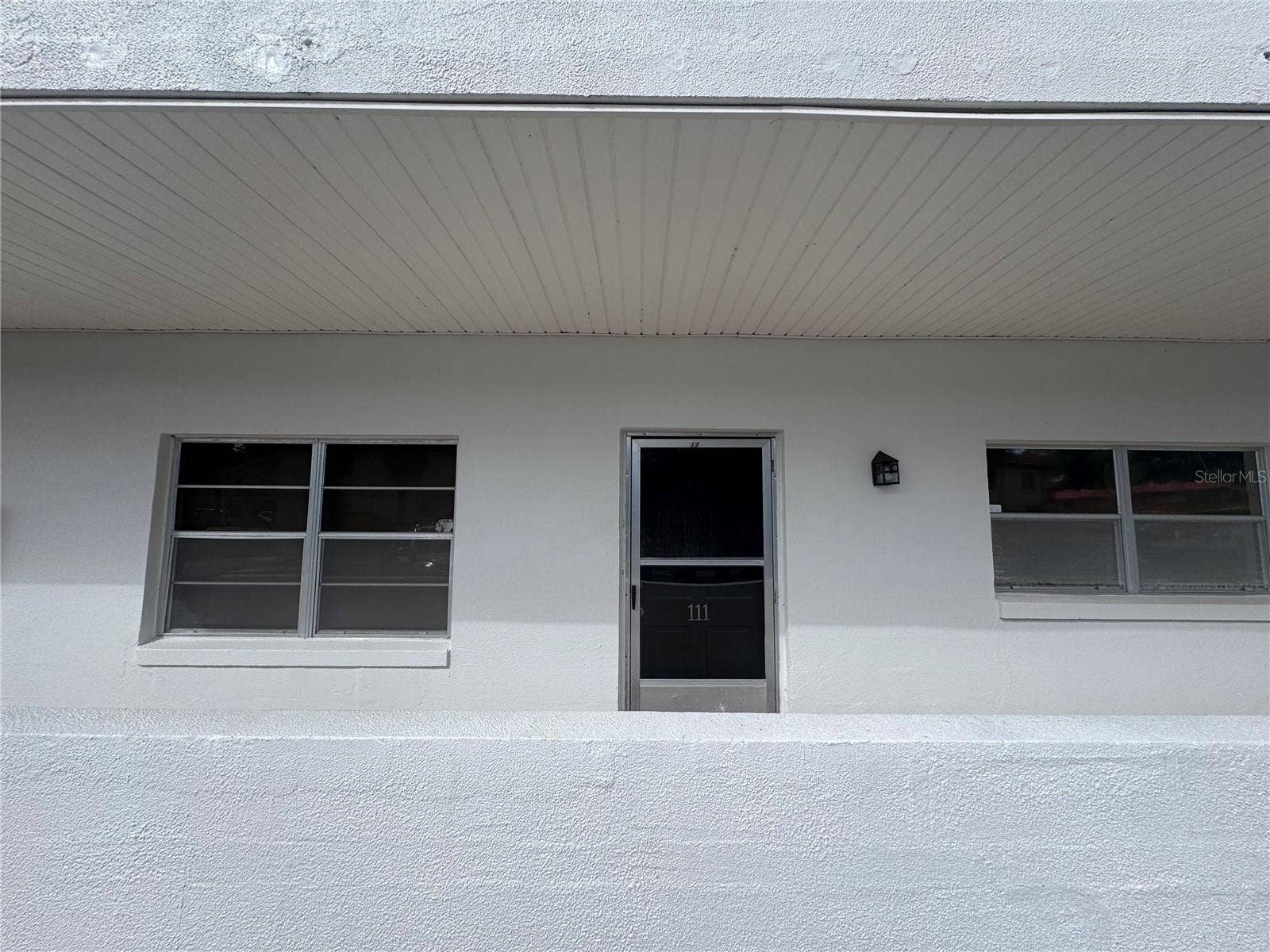 100 EL CAMINO DRIVE, #111, Winter Haven, FL 33884 Front Door view - 1st Floor Unit