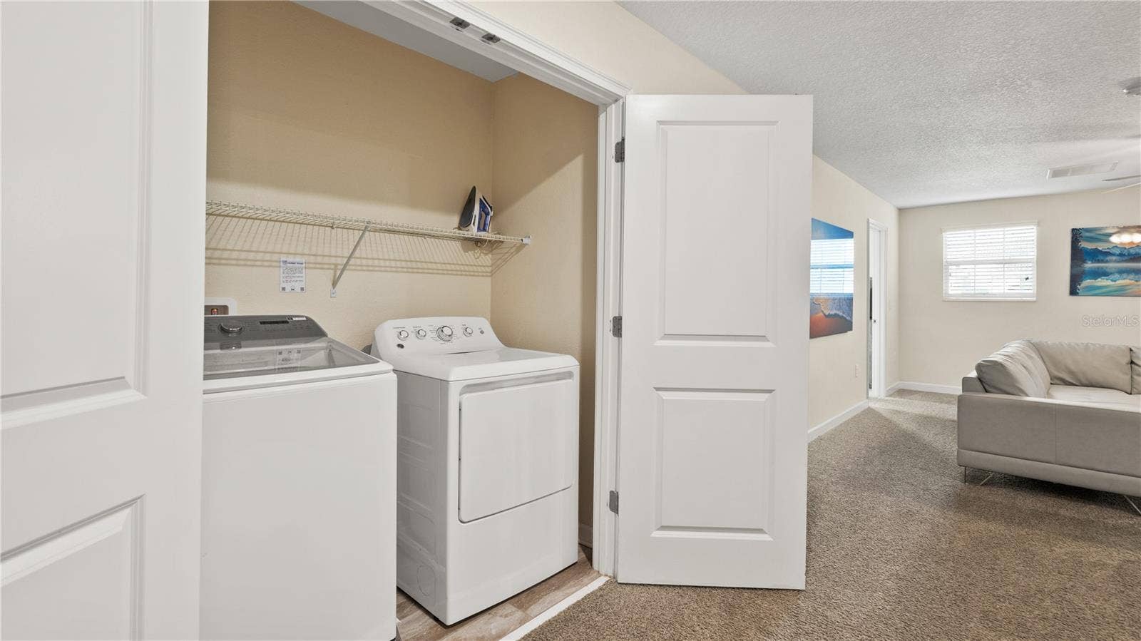 9098 HAZARD STREET, Davenport, FL 33896 LAUNDRY UPSTAIR
