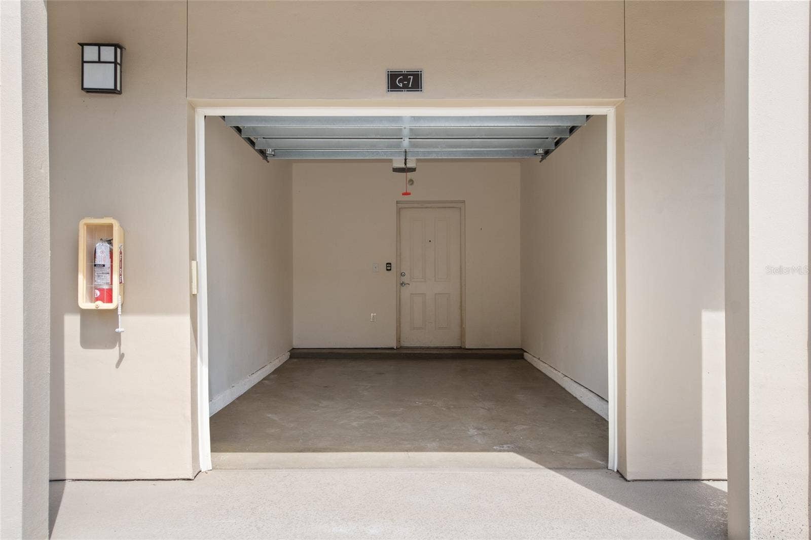 1410 CELEBRATION AVENUE, #102, Celebration, FL 34747 ATTACHED ONE CAR GARAGE
