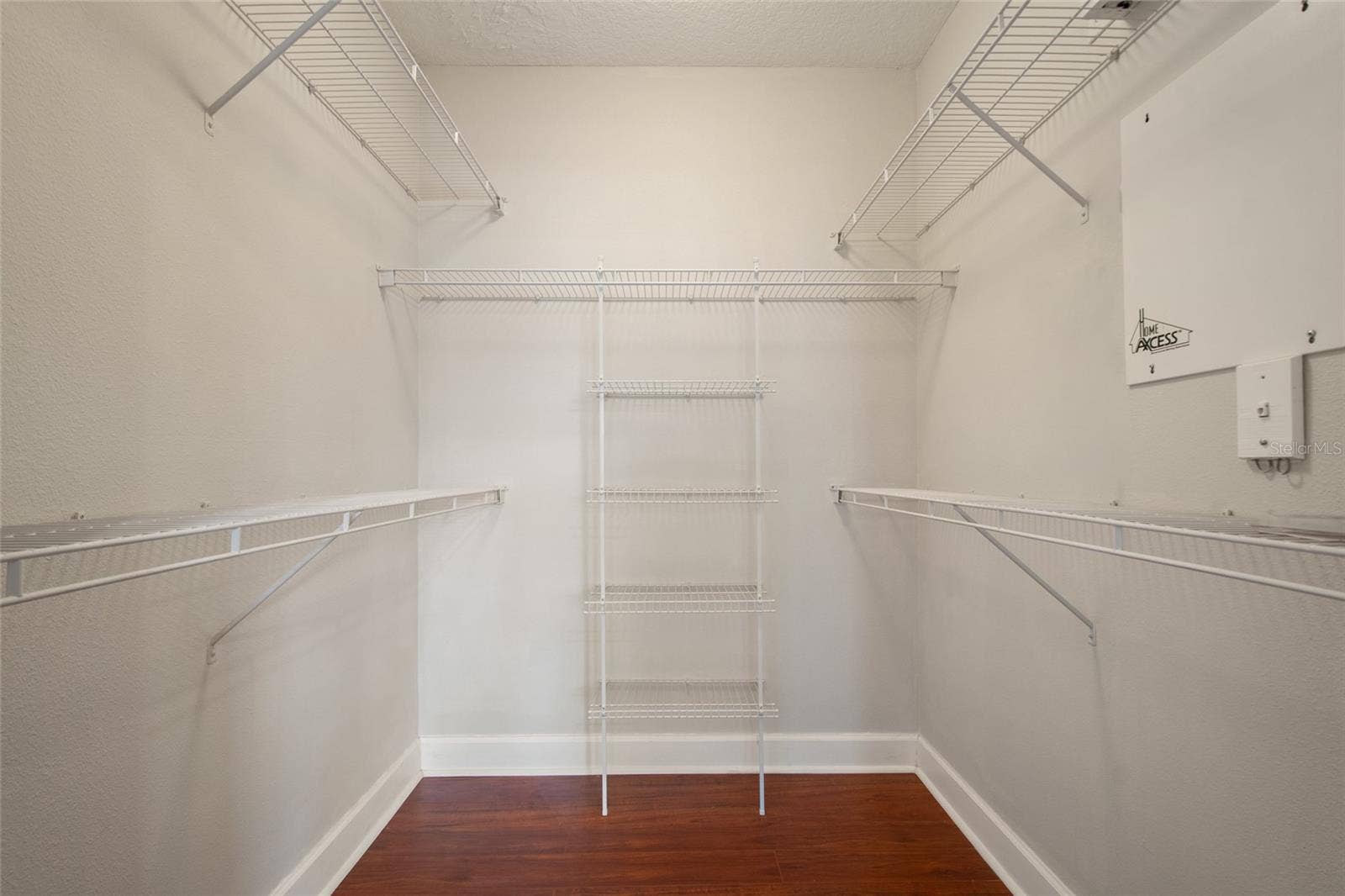 1410 CELEBRATION AVENUE, #102, Celebration, FL 34747 PRIMARY BEDROOM CLOSET