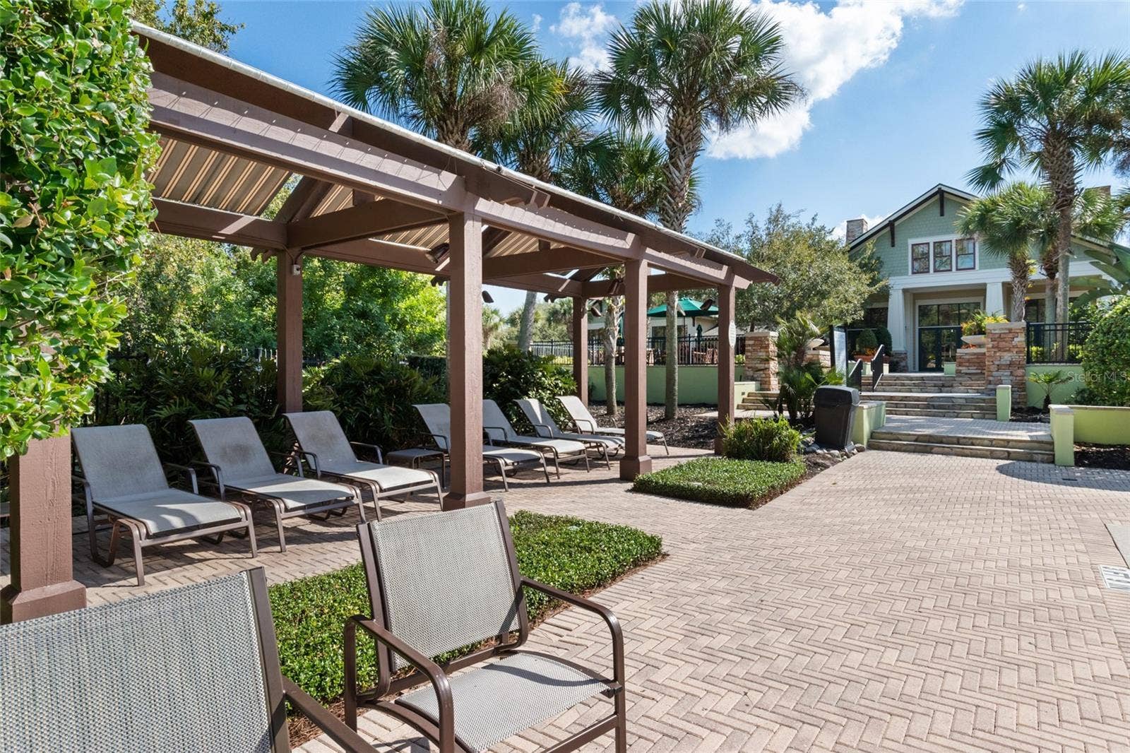 1410 CELEBRATION AVENUE, #102, Celebration, FL 34747 LOUNGE CHAIRS BY THE POOL