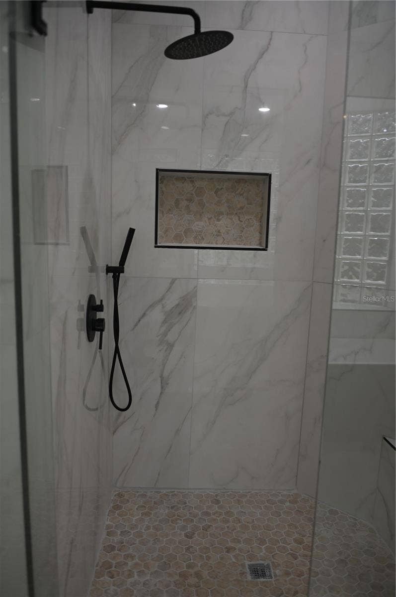 8800 OAK LANDINGS COURT, Orlando, FL 32836 Master bathroom shower area