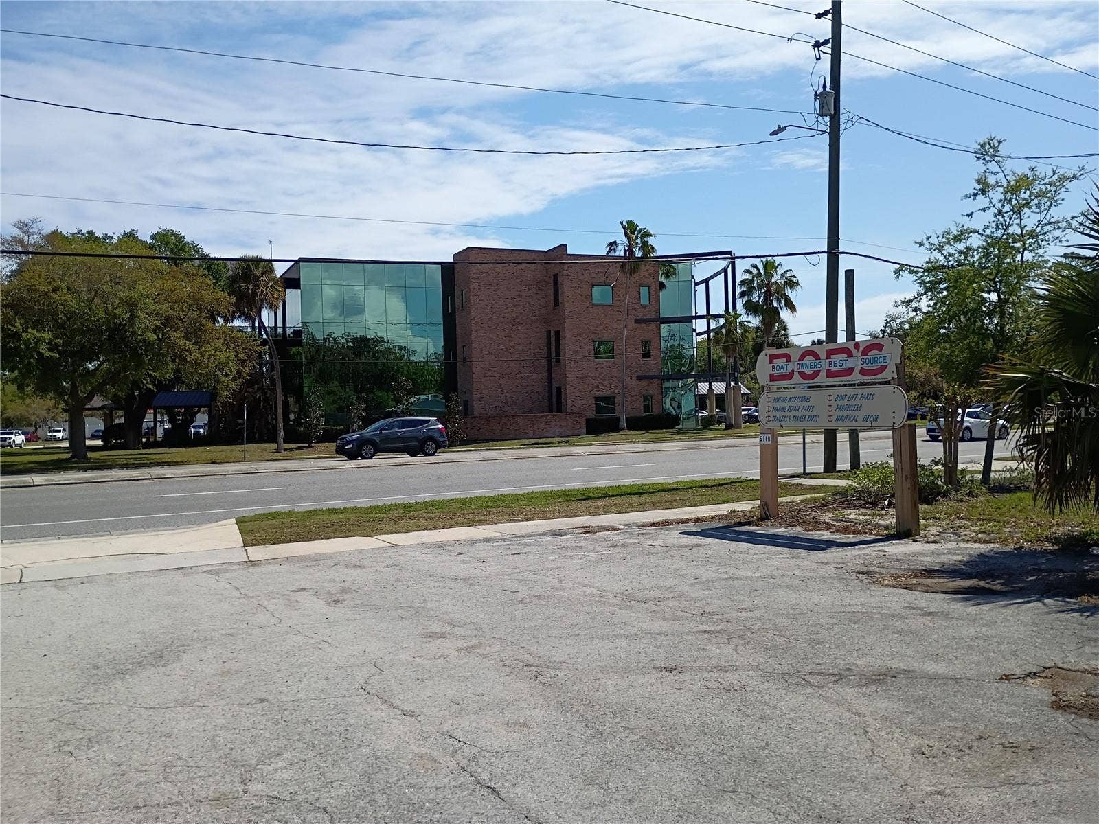5110 S RIDGEWOOD AVENUE, Port Orange, FL 32127 Beautiful Neighboring buildings adding value to the area