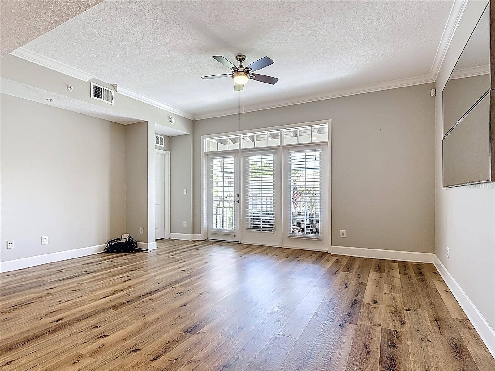 1231 WRIGHT CIR, #308, Celebration, FL 34747 Entertainment Alcove and French Door to Terrace