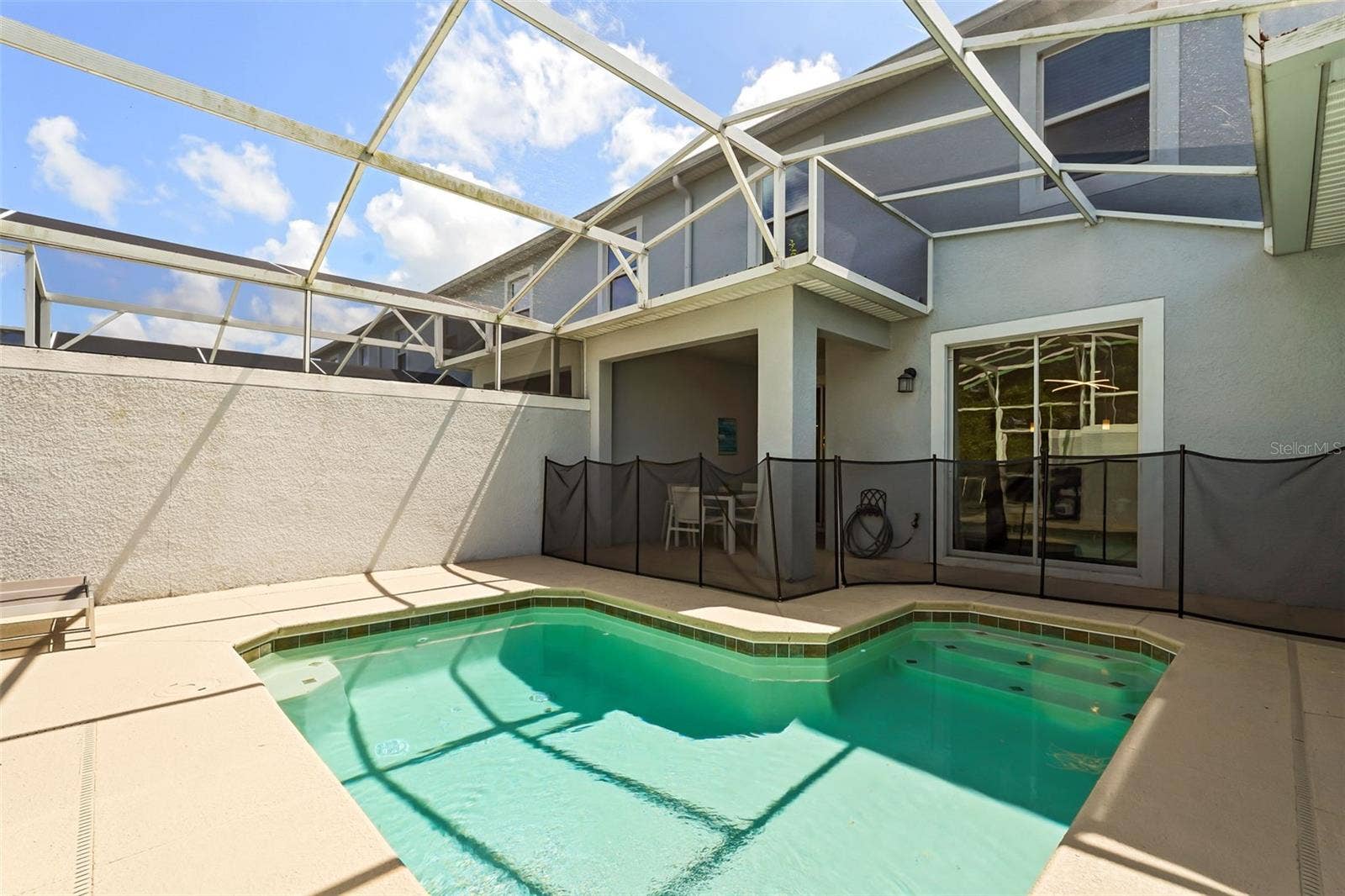 374 OCEAN COURSE AVENUE, Davenport, FL 33896 Gorgeous outdoor patio to watch all your sunsets.