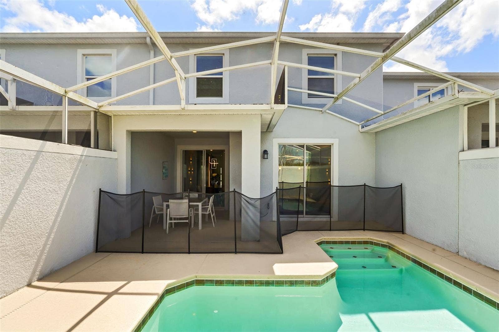 374 OCEAN COURSE AVENUE, Davenport, FL 33896 Gorgeous outdoor patio to watch all your sunsets.