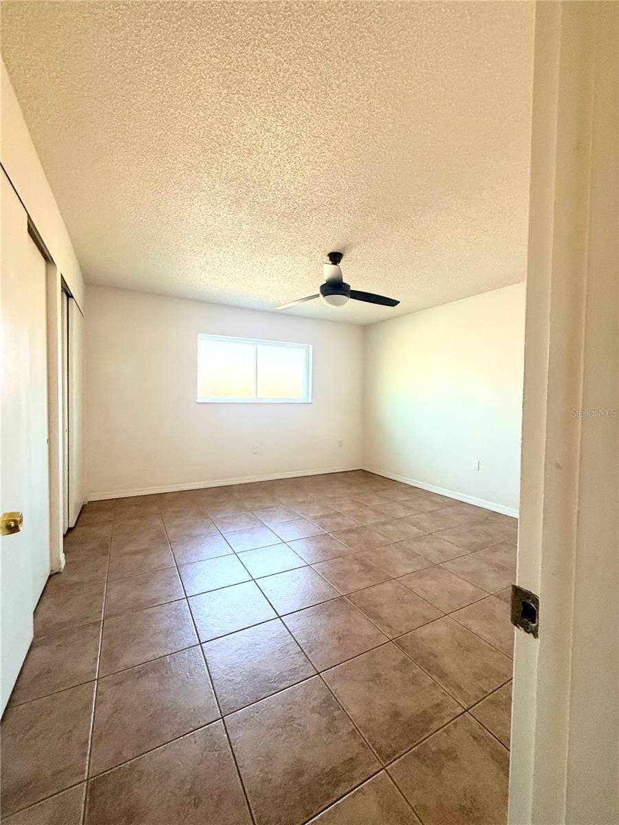 1000 LAKE OF THE WOODS BOULEVARD, #101B, Casselberry, FL 32730 primary bedroom