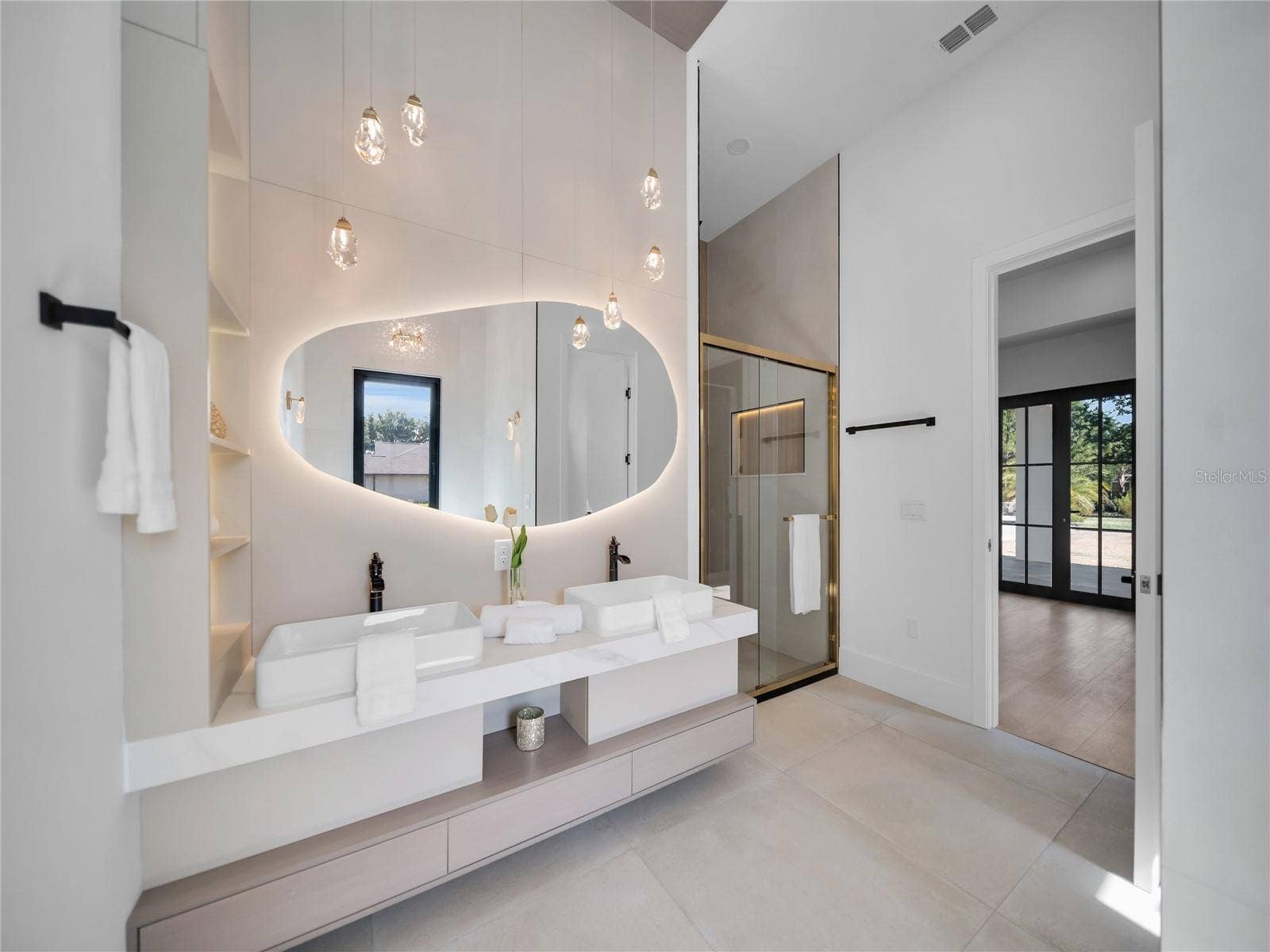 11241 OSWALT ROAD, Clermont, FL 34711 Primary bath with dual vanities and upscale finishes