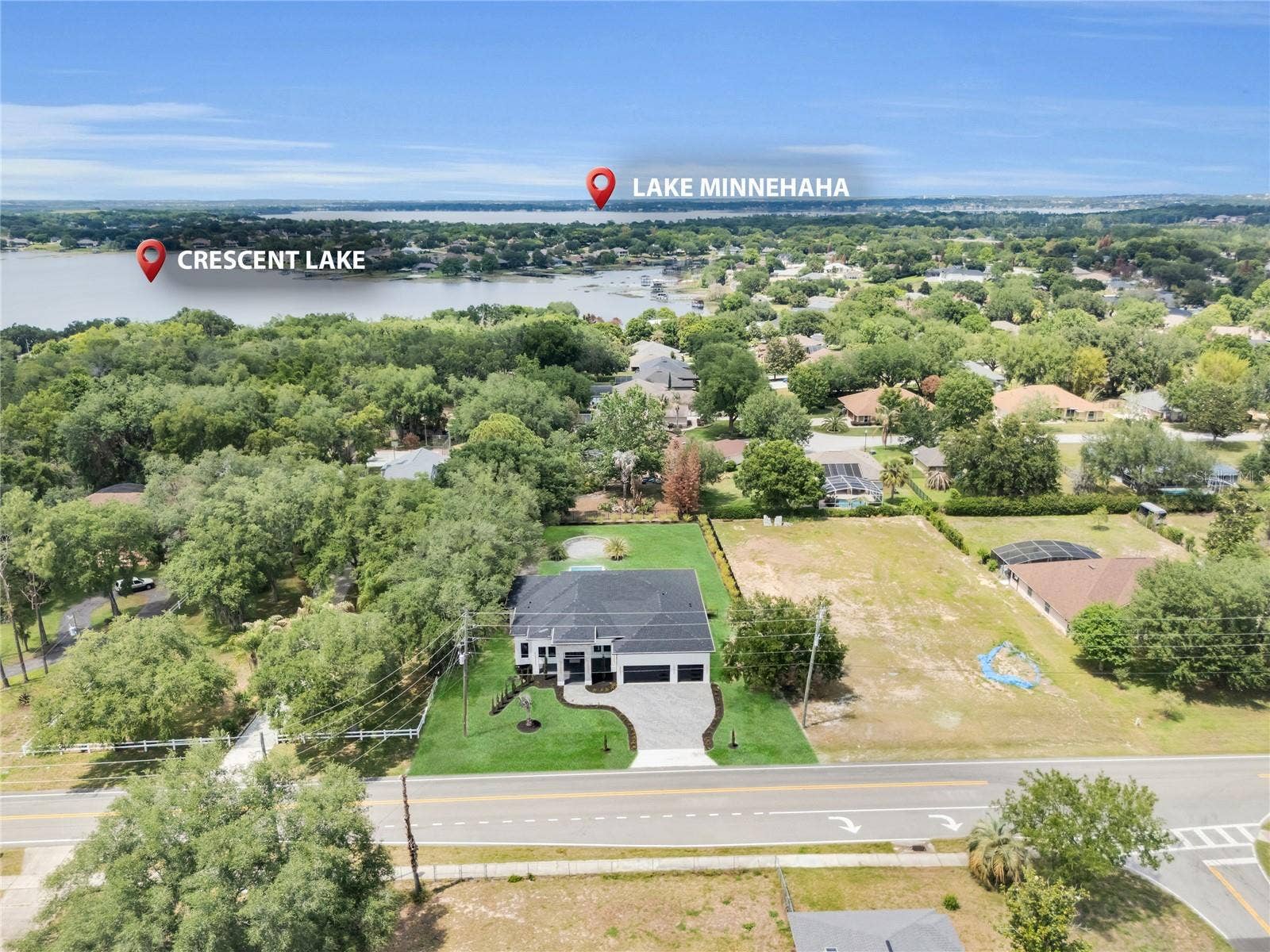 11241 OSWALT ROAD, Clermont, FL 34711 Aerial view of nearby lake area