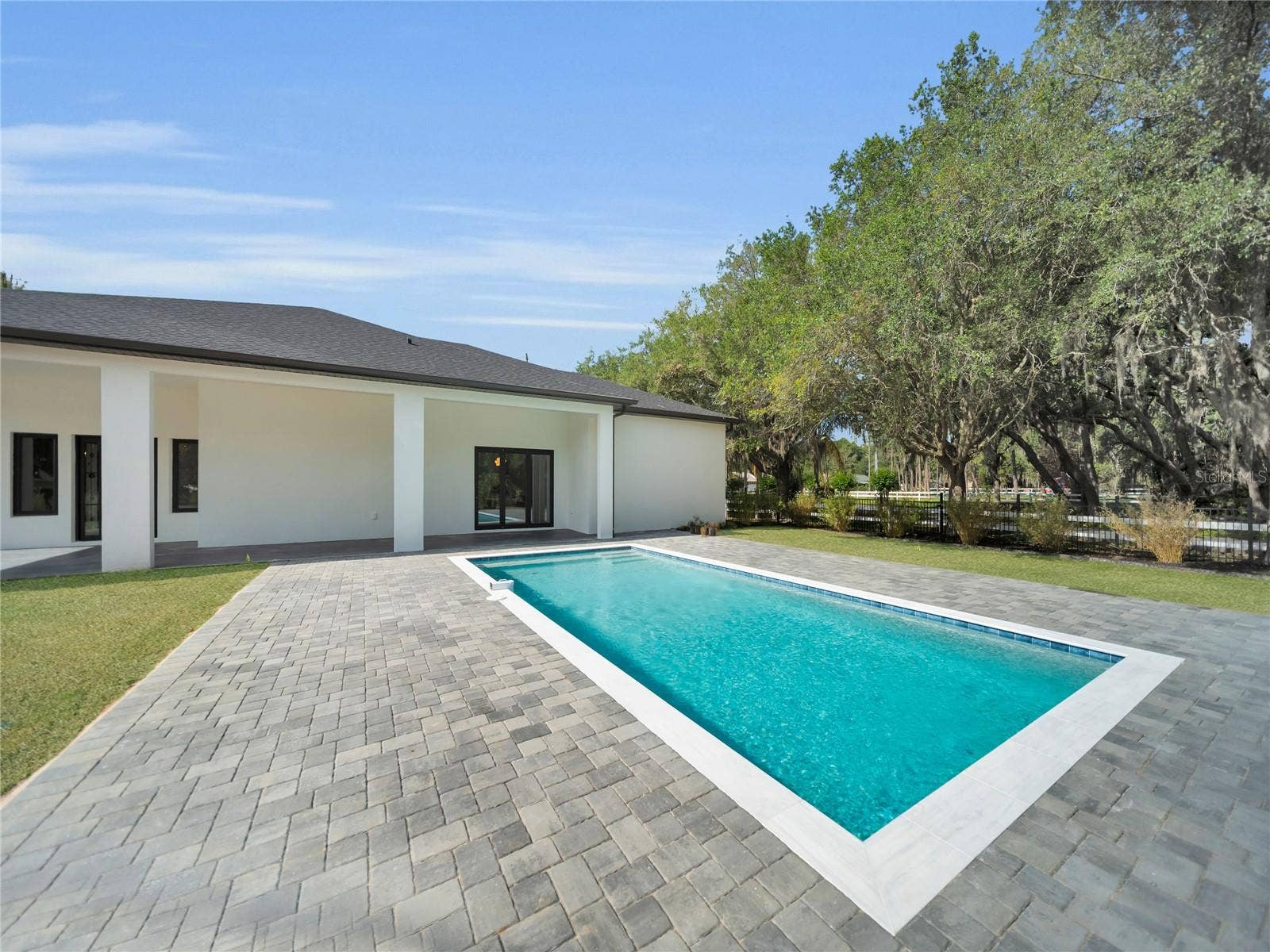 11241 OSWALT ROAD, Clermont, FL 34711 Pool with expansive paver deck
