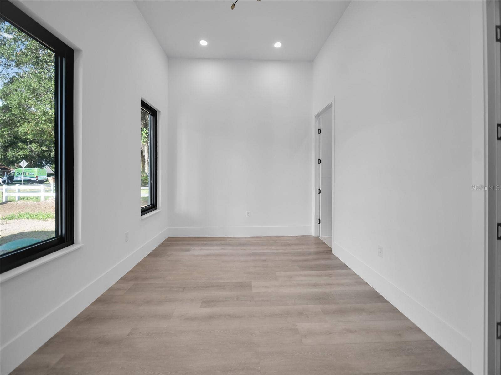 11241 OSWALT ROAD, Clermont, FL 34711 Secondary bedroom with modern finishes
