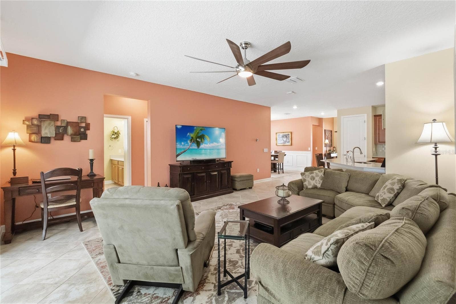 1361 OLYMPIC CLUB BOULEVARD, Champions Gate, FL 33896 open concept family room to kitchen and dining areas