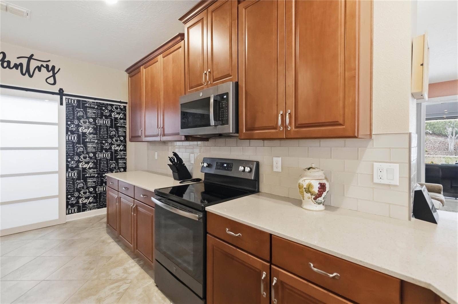 1361 OLYMPIC CLUB BOULEVARD, Champions Gate, FL 33896 maple cabinetry, quartz countertops