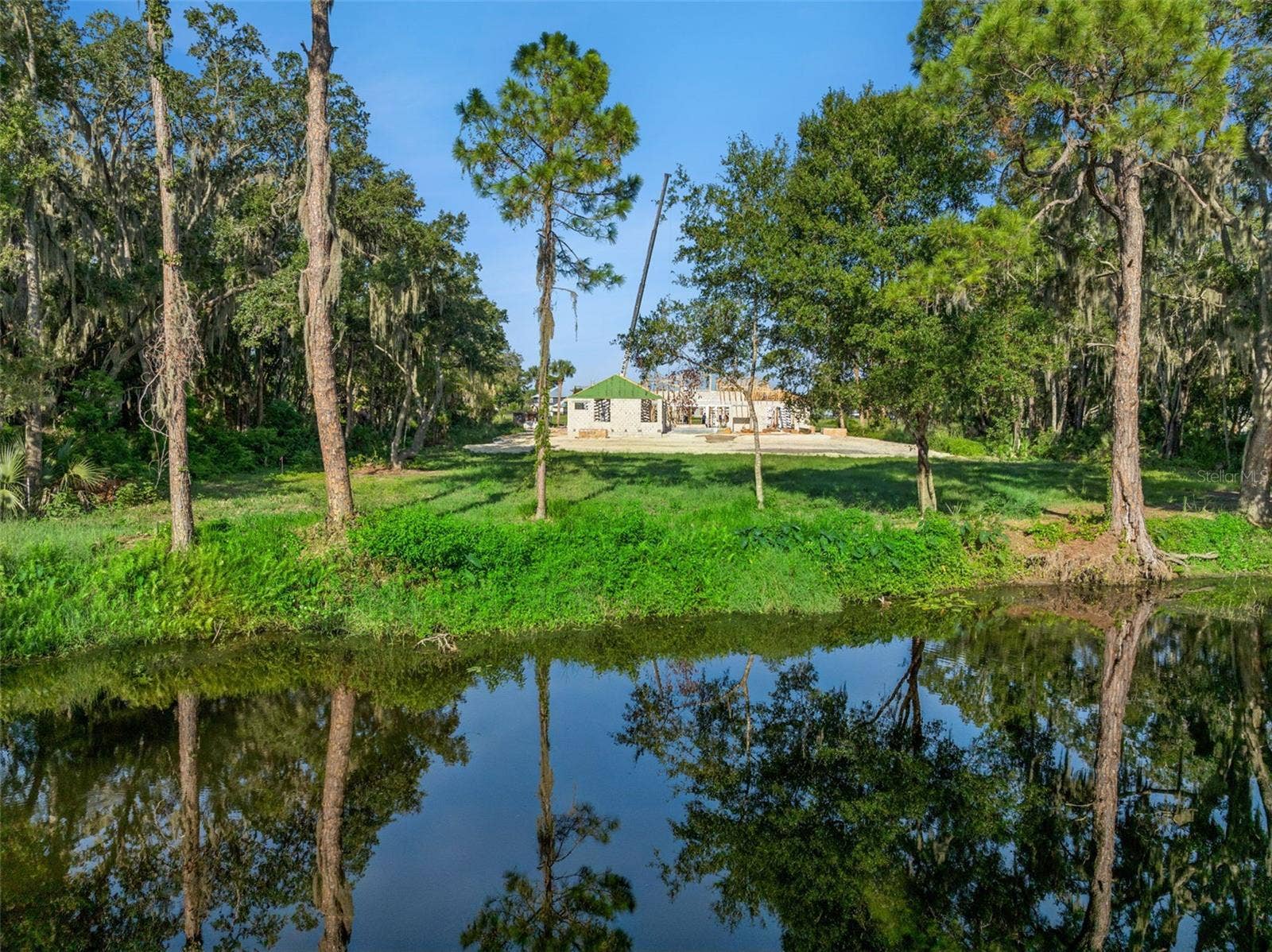 3654 HIDDEN RIVER LANE, Tavares, FL 32778 View from the water looking towards front of property