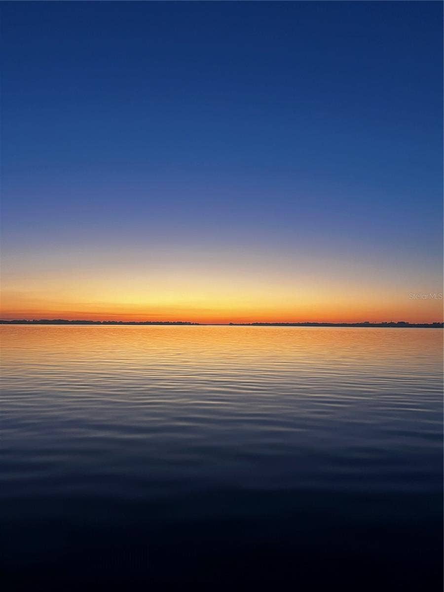 3654 HIDDEN RIVER LANE, Tavares, FL 32778 Sunset on the lakes; cruise home under the stars!