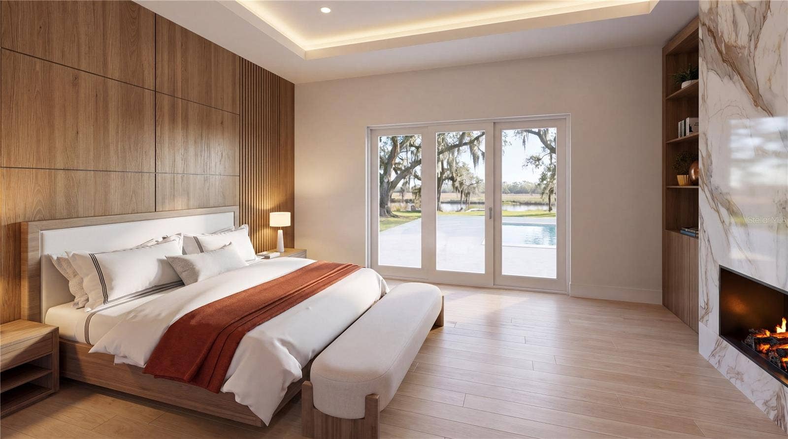 3654 HIDDEN RIVER LANE, Tavares, FL 32778 Primary bedroom with fireplace and serene finishes for blissful sleep