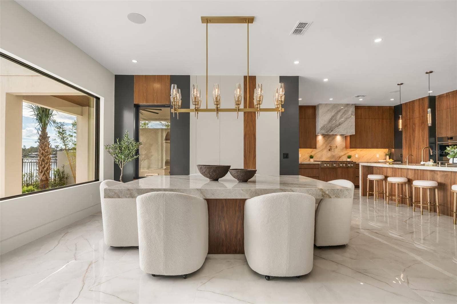 9117 BAY POINT DRIVE, Orlando, FL 32819 Dining table which seats 10