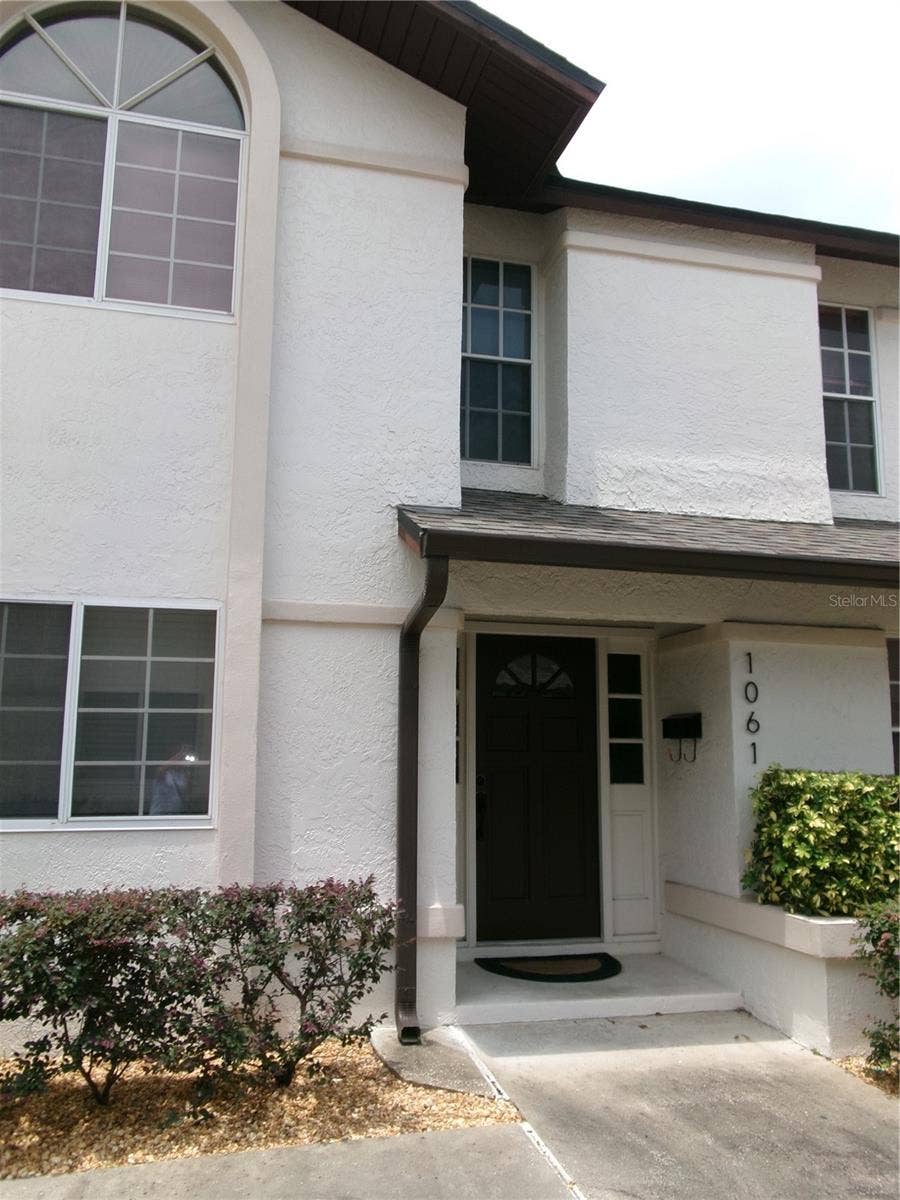 1061 ARAGON AVENUE, #1061, Winter Park, FL 32789 Two story stucco home with private entrance