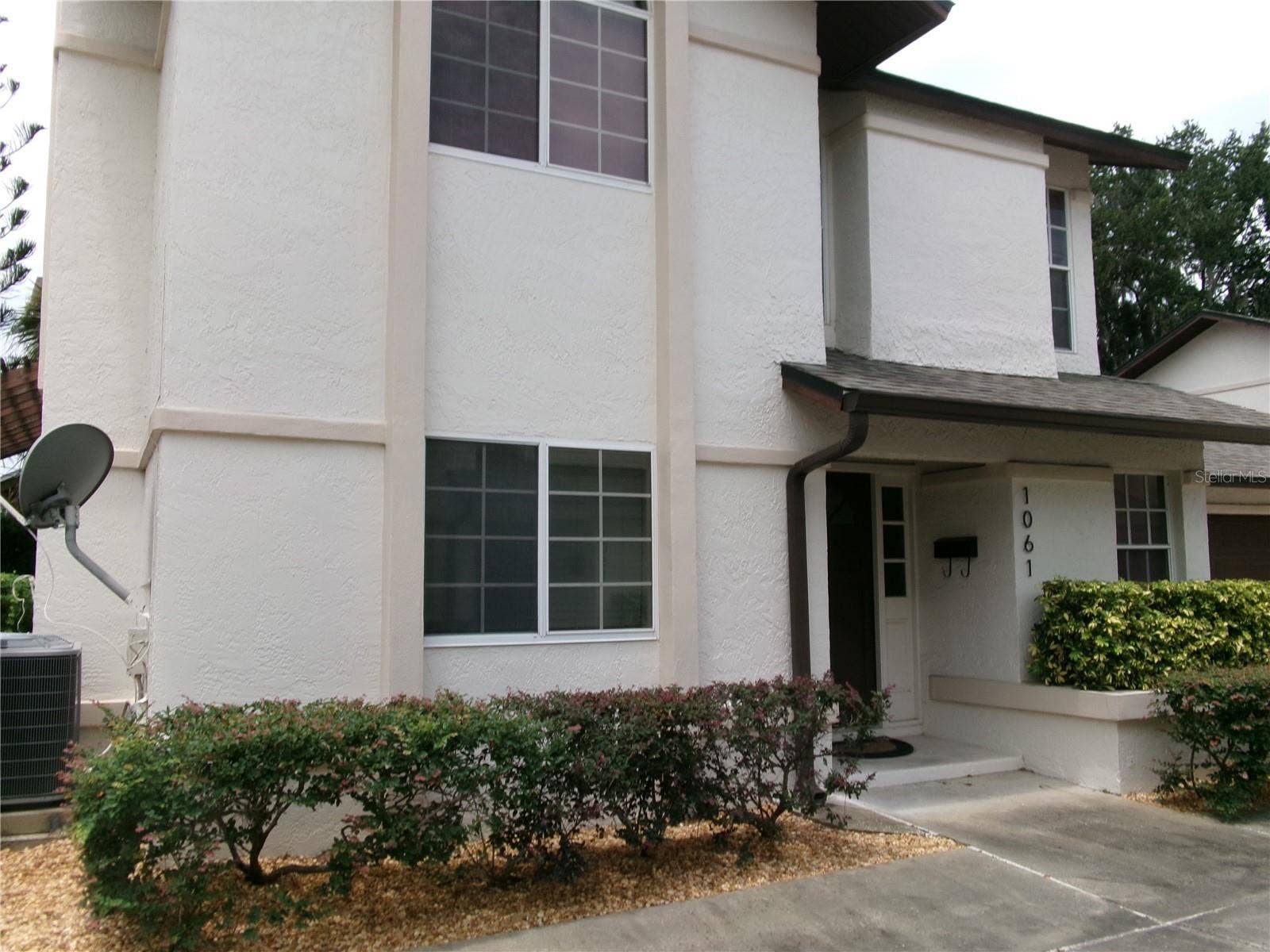 1061 ARAGON AVENUE, #1061, Winter Park, FL 32789 Two story stucco home with private entrance