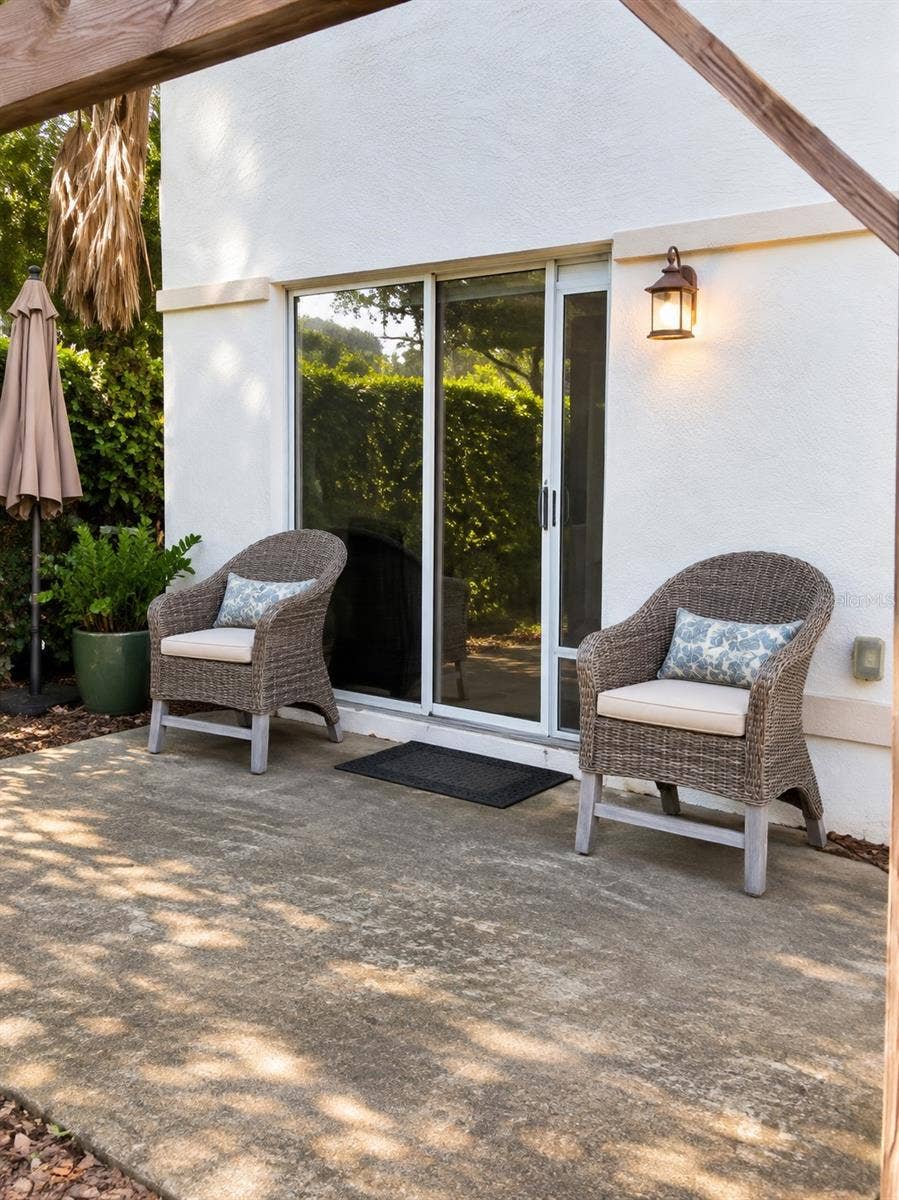 1061 ARAGON AVENUE, #1061, Winter Park, FL 32789 Private patio from dining room sliding doors