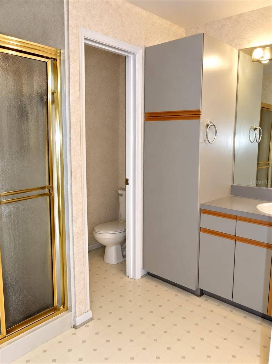 1061 ARAGON AVENUE, #1061, Winter Park, FL 32789 Lots of storage in primary bathroom, and private water closet