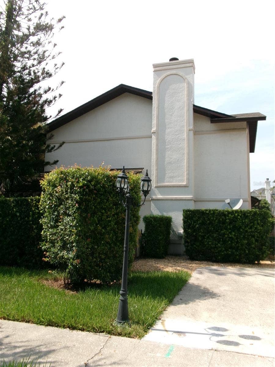 1061 ARAGON AVENUE, #1061, Winter Park, FL 32789 View from the street. One guest parking space is in front of 1061