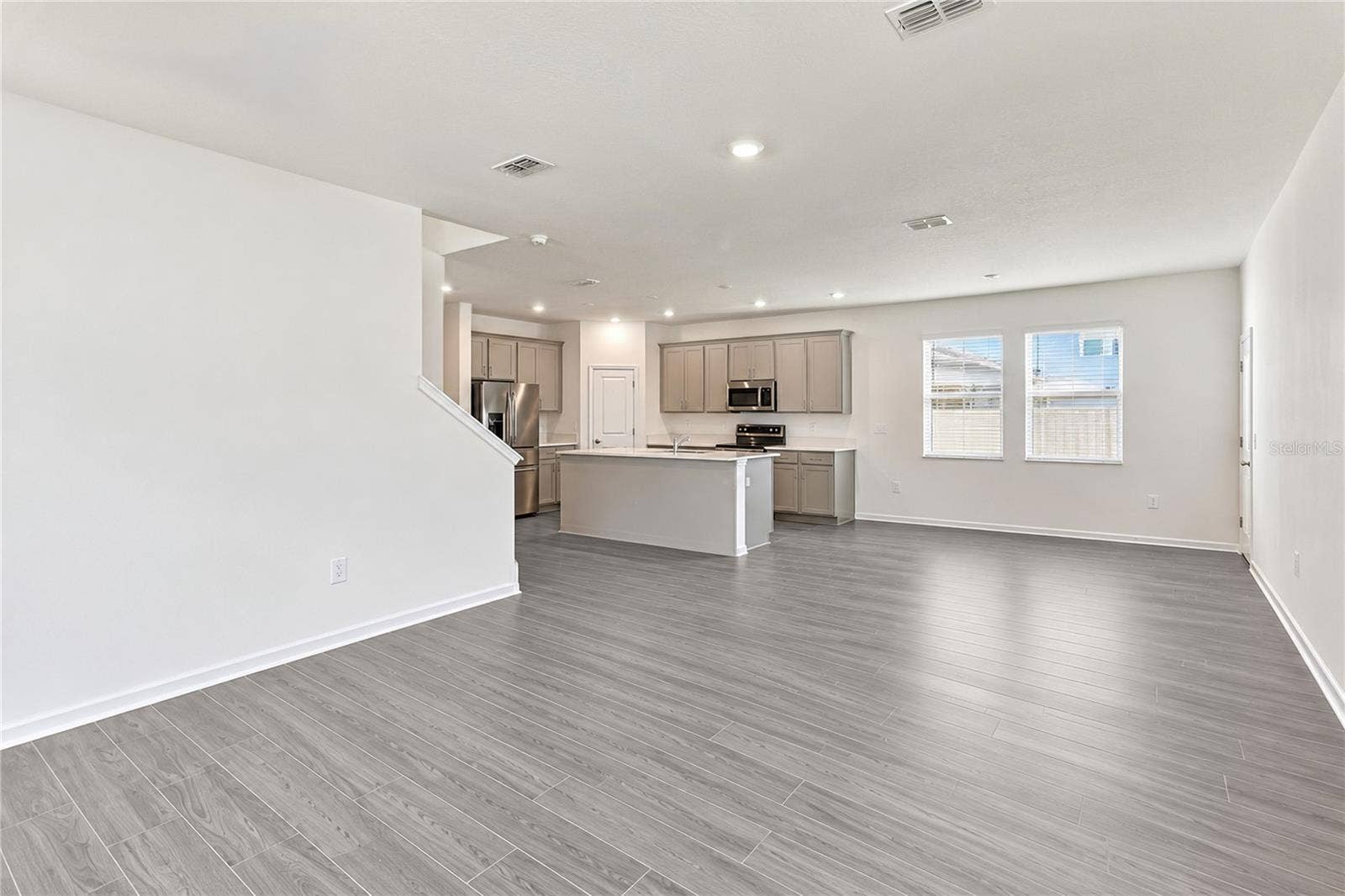 6459 PINE FORK ALLEY, St Cloud, FL 34771 Living Room, Dinette and Kitchen