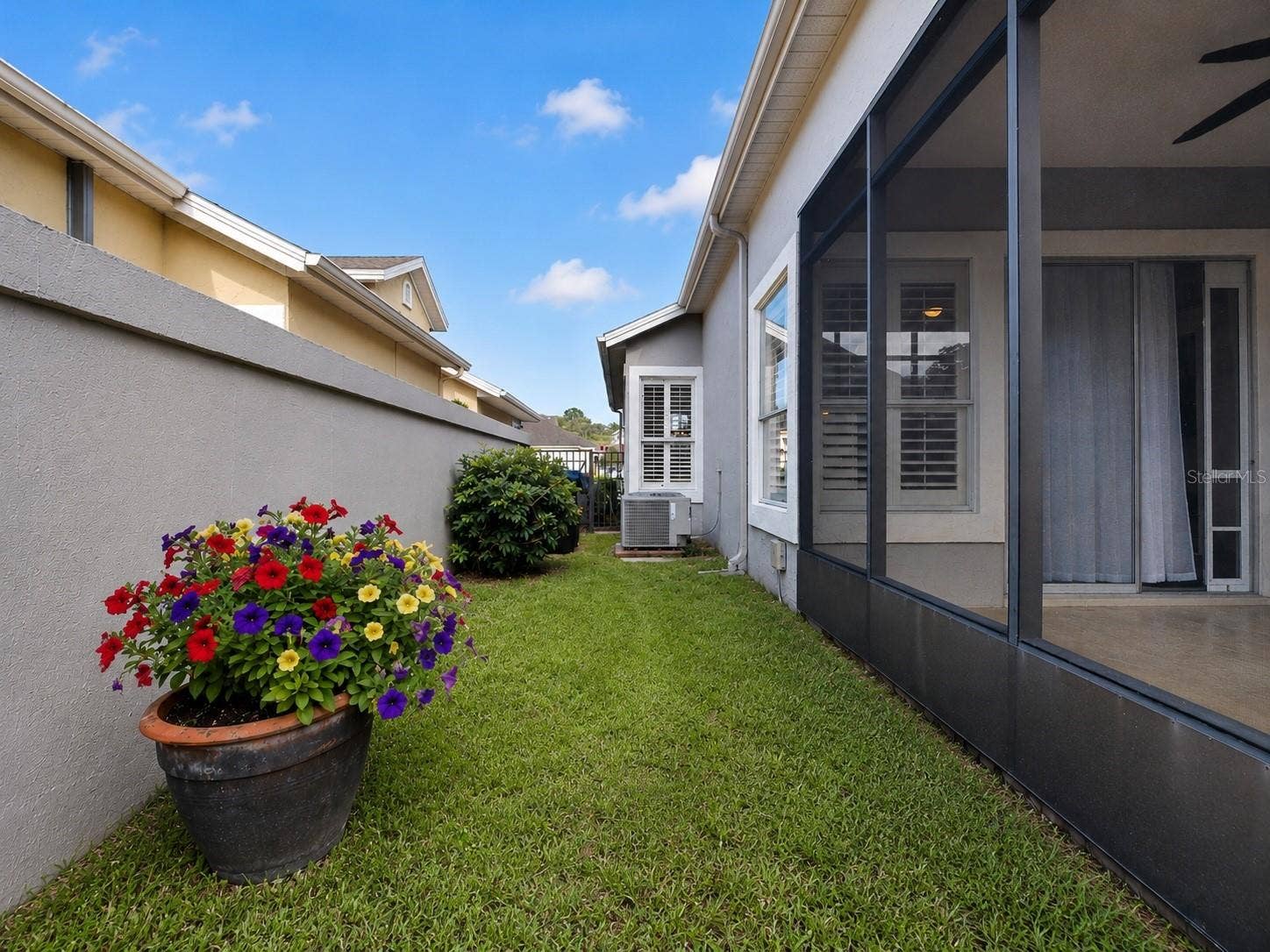 14435 WINDCHIME LANE, Orlando, FL 32837 Enhanced Grass