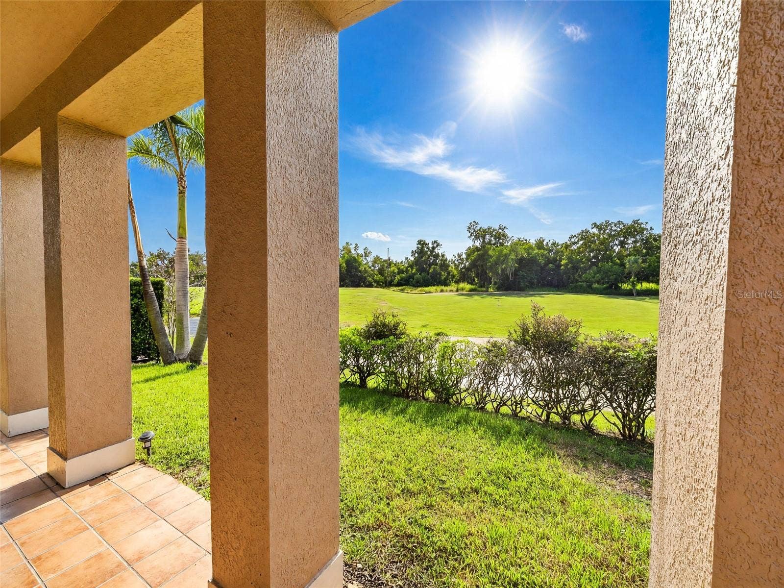 7526 EXCITEMENT DRIVE, Reunion, FL 34747 Rear Patio of Main Home Facing the Golf Course