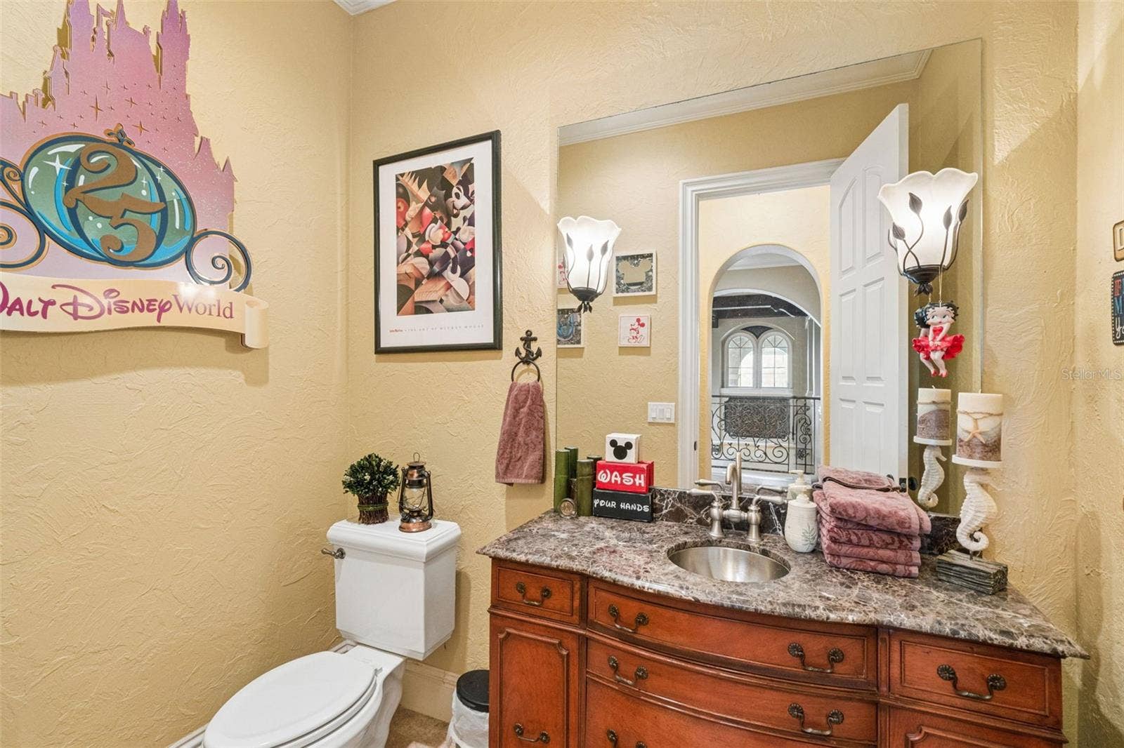 9400 LAWS RD, Clermont, FL 34714 2nd floor game room half bath