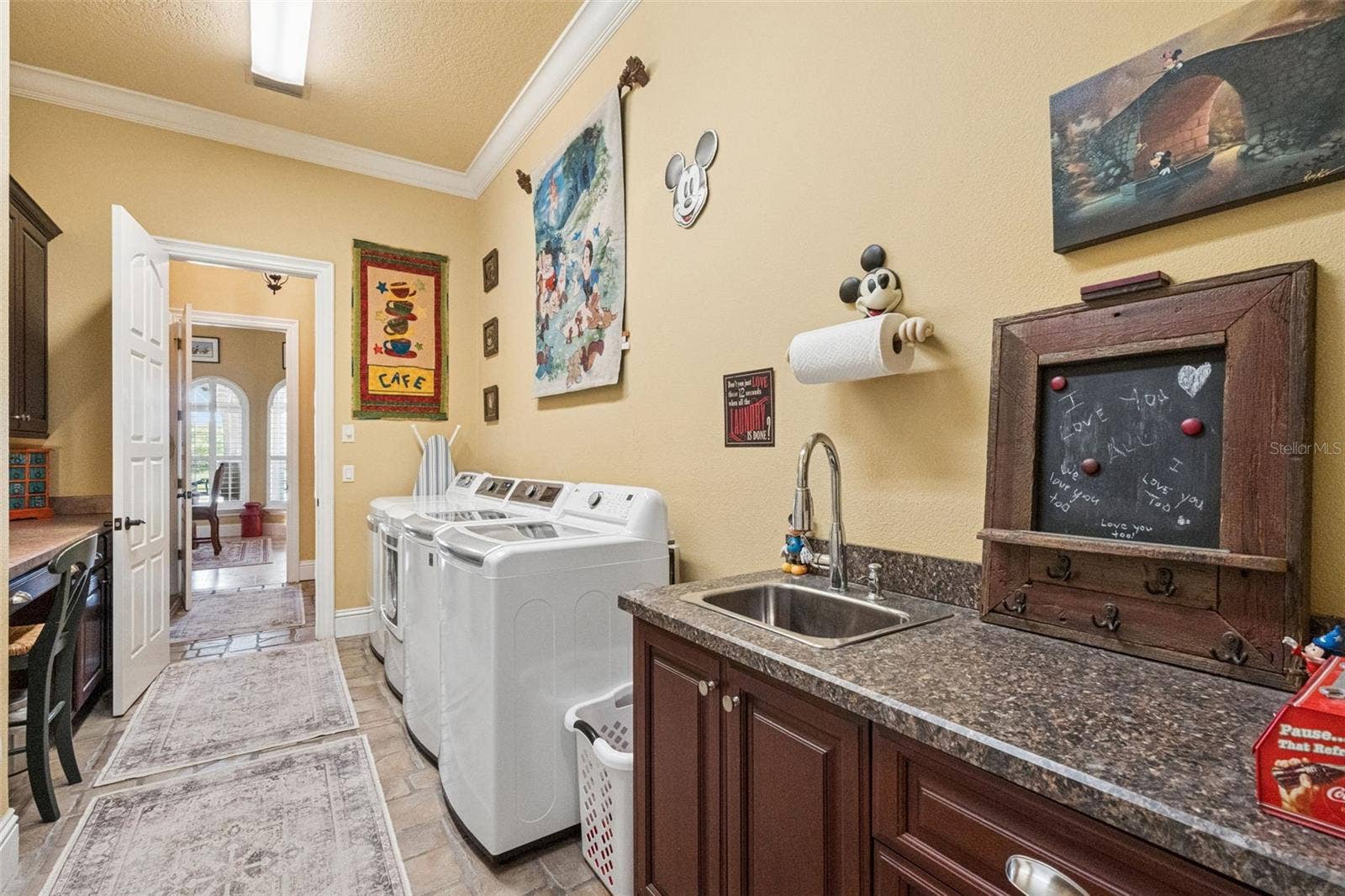 9400 LAWS RD, Clermont, FL 34714 2 washers and dryers on the first floor