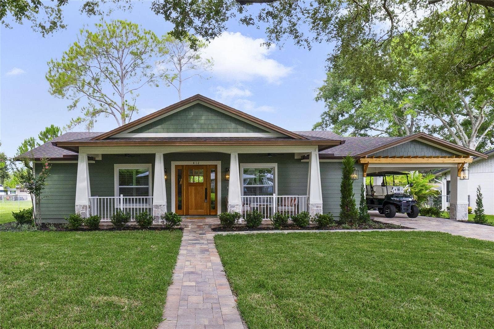 412 N BOYD STREET, Winter Garden, FL 34787 Welcome home to this craftsman inspired custom home in the heart of downtown Winter Garden!