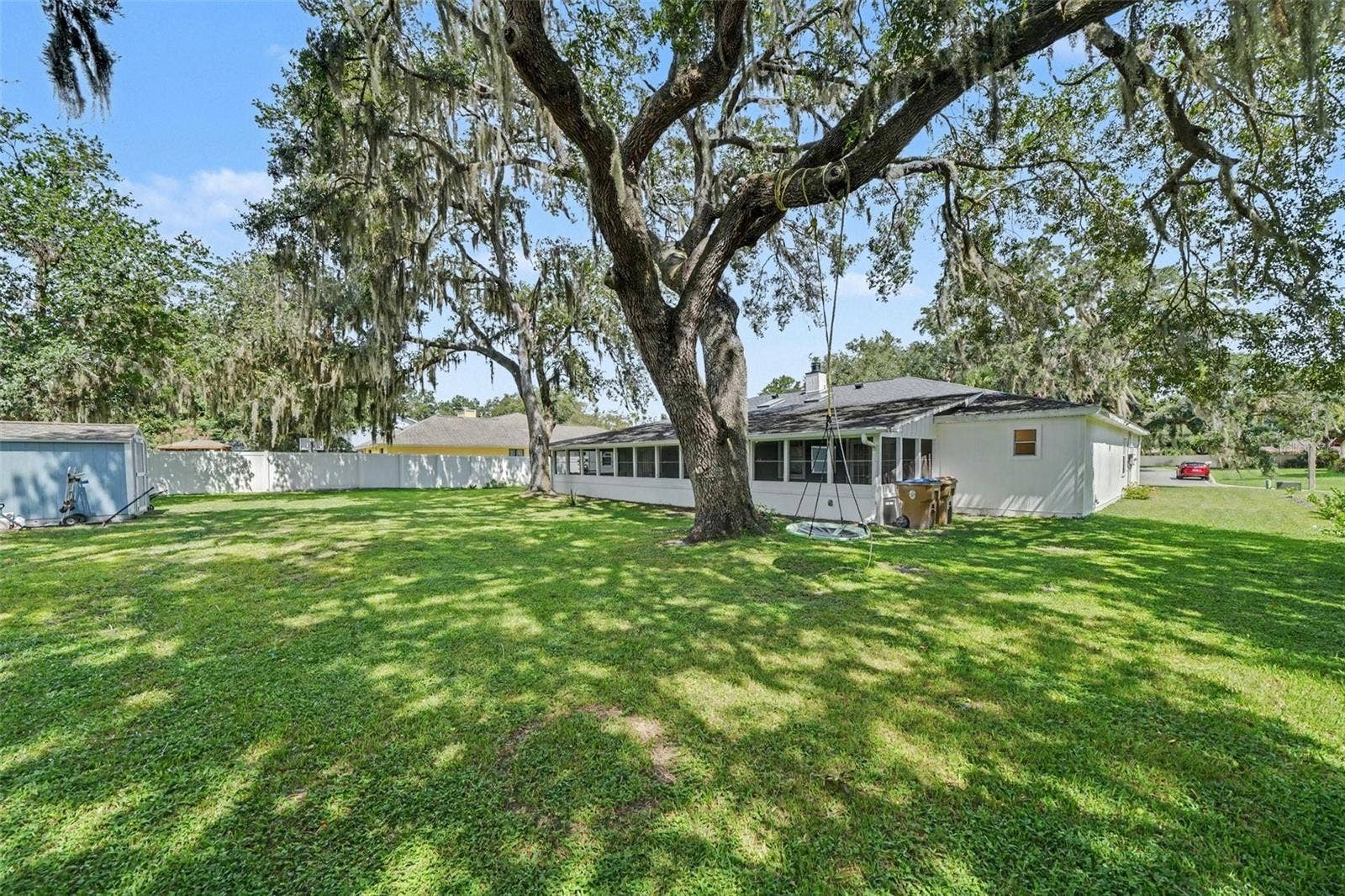 1592 SKYLINE DRIVE, Kissimmee, FL 34744 extra large back yard with Shed & tree swing