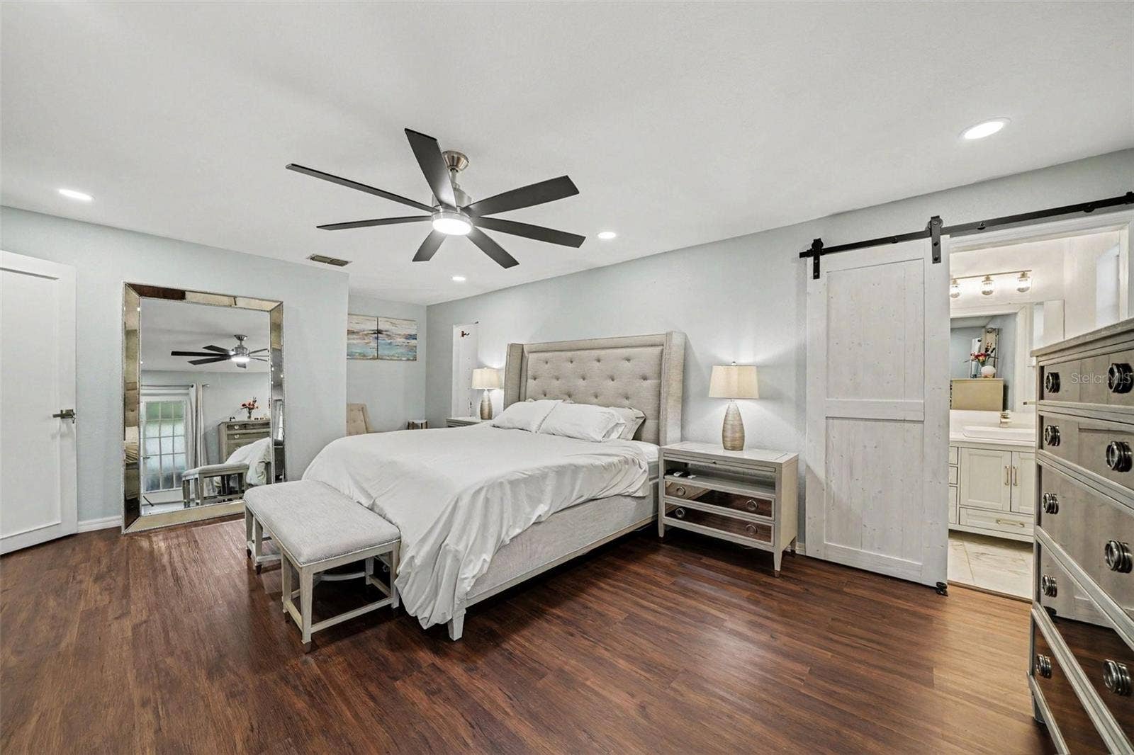1592 SKYLINE DRIVE, Kissimmee, FL 34744 Primary Bedroom w/Barn Door to ensuite Bathroom
