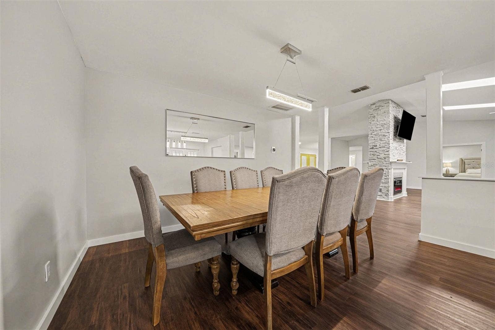 1592 SKYLINE DRIVE, Kissimmee, FL 34744 Dining Area accented by columns w/seating for 8