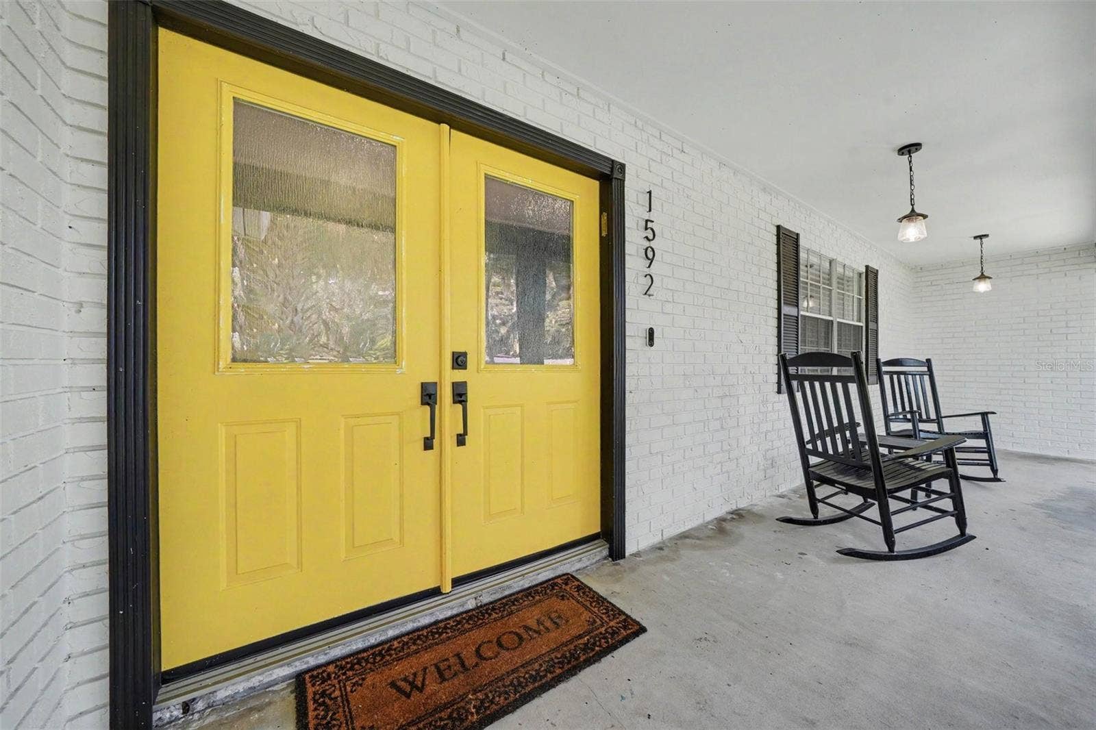 1592 SKYLINE DRIVE, Kissimmee, FL 34744 Charming front porch to enjoy your coffee