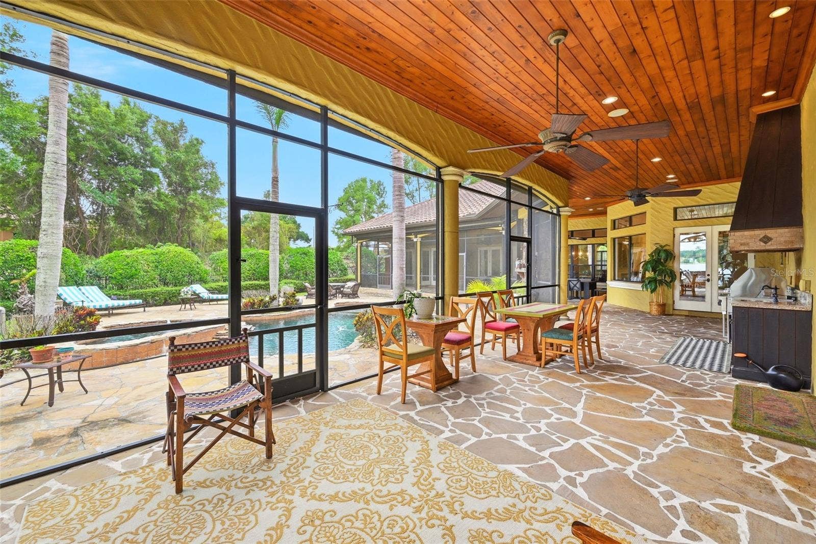 9679 WESTOVER ROBERTS RD, Windermere, FL 34786 Screened-In Lanai With Full Summer Kitchen