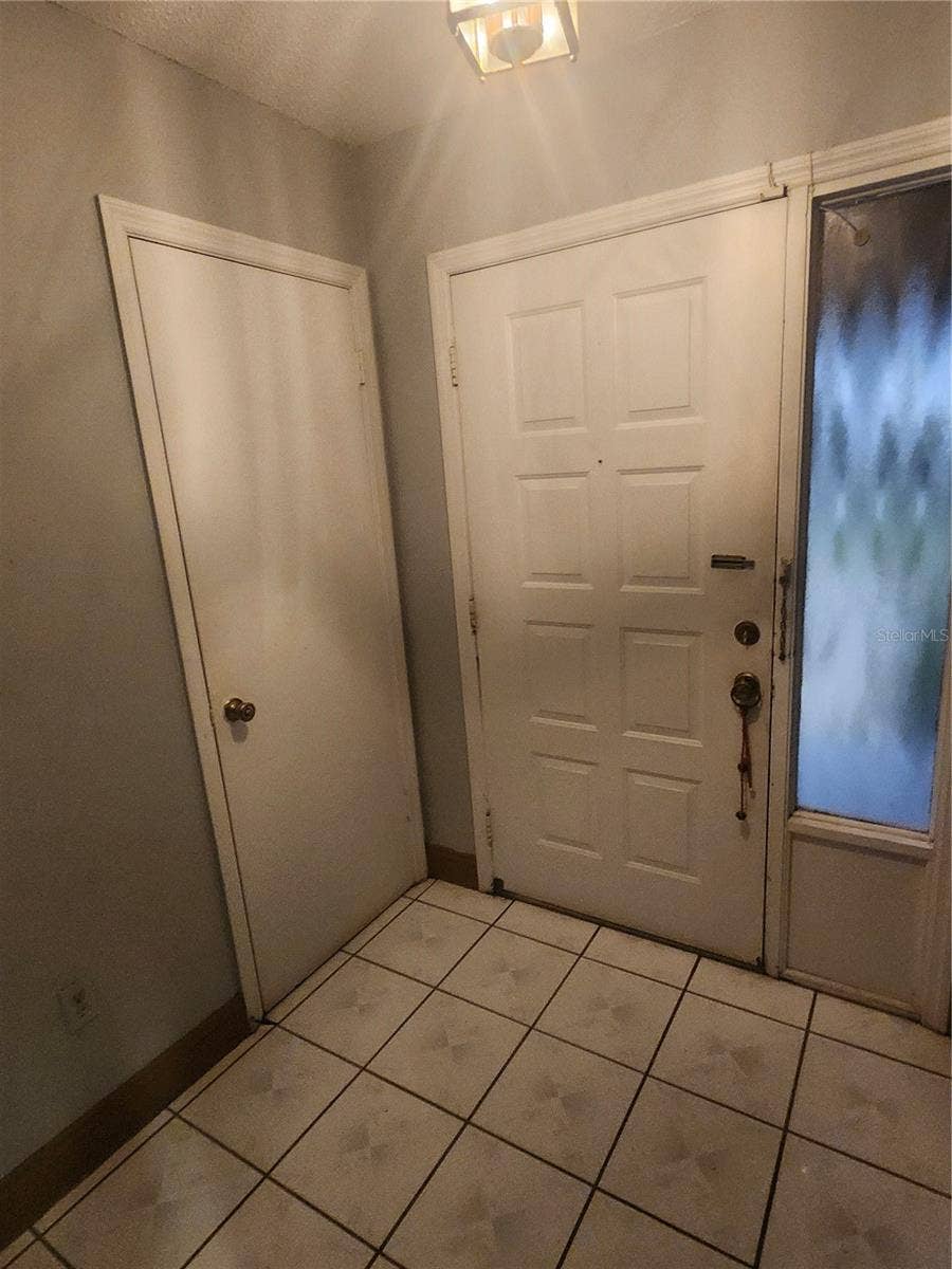 Orlando, FL 32836 VIEW OF FRONT DOOR AND ENTRY CLOSET