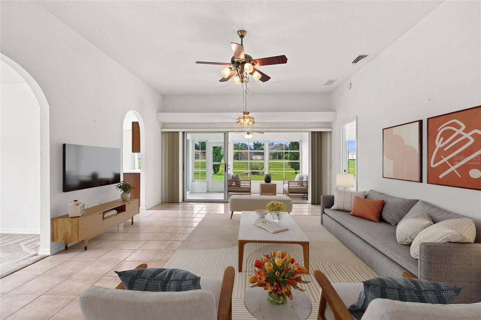 347 ROYAL PALM DR, Davenport, FL 33837 Virtually staged Great Room and Lanai