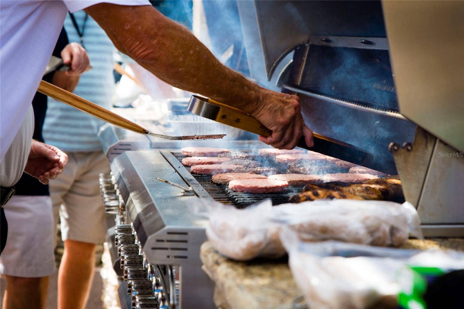 347 ROYAL PALM DR, Davenport, FL 33837 One of many community get togethers at the outdoor kitchen