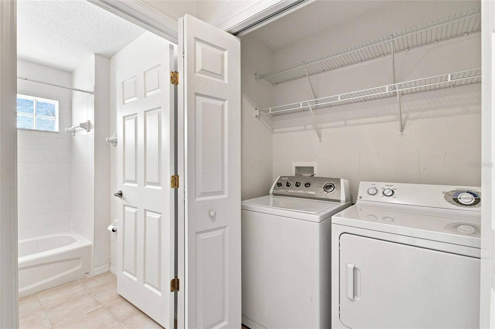 347 ROYAL PALM DR, Davenport, FL 33837 Laundry closet between Guest bedroom & bathroom