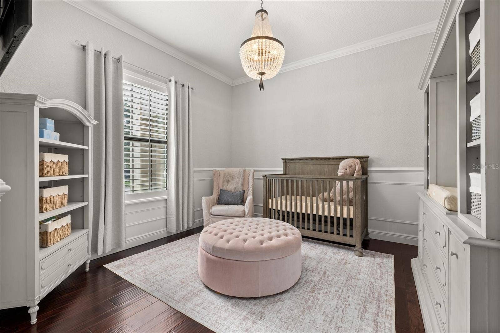 5526 MARLEON DRIVE, Windermere, FL 34786 Bedroom 5 (downstairs) which is currently used as a nursery is situated close to the primary bedroom