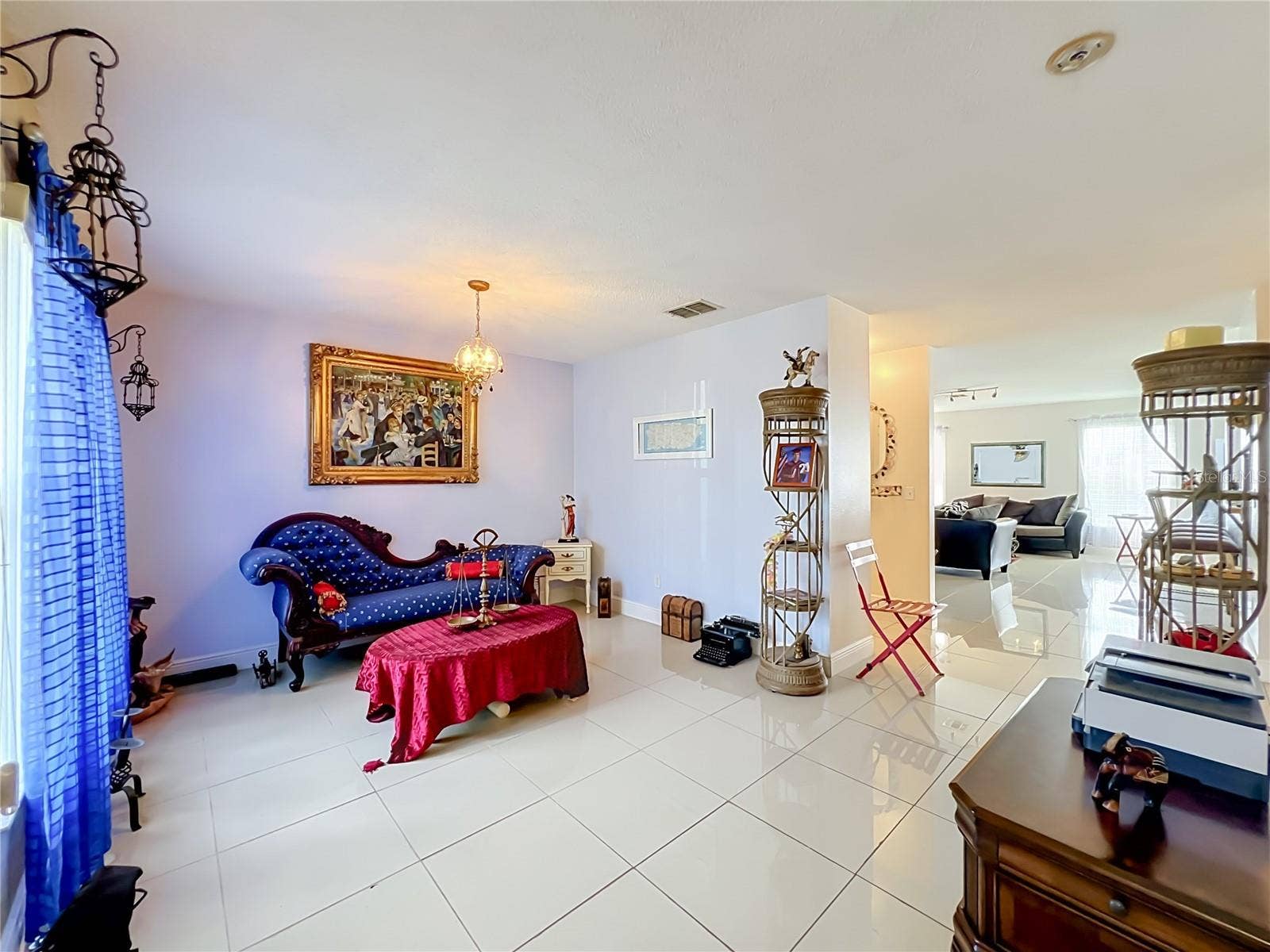 12900 LOS ALAMITOS COURT, Orlando, FL 32837 Living room is at the front of the house