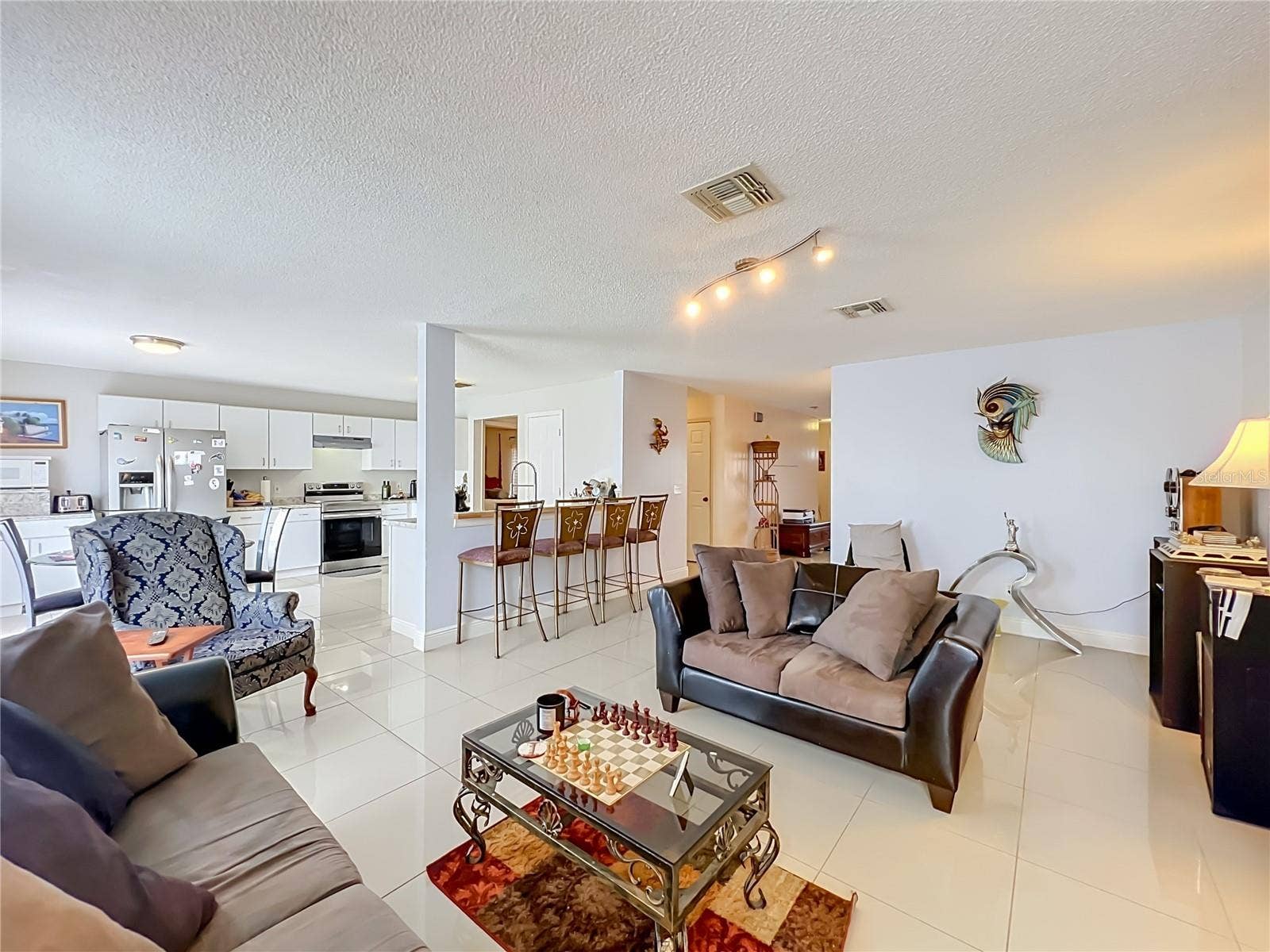 12900 LOS ALAMITOS COURT, Orlando, FL 32837 Family room/Kitchen/Dinette