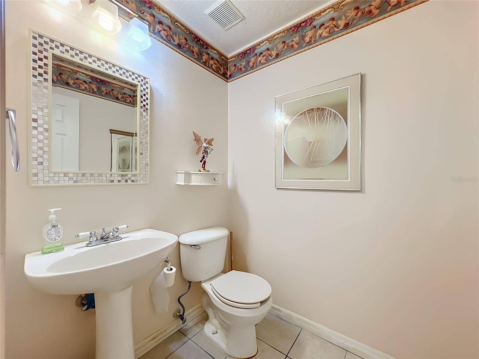 12900 LOS ALAMITOS COURT, Orlando, FL 32837 1/2 bath on 1st floor