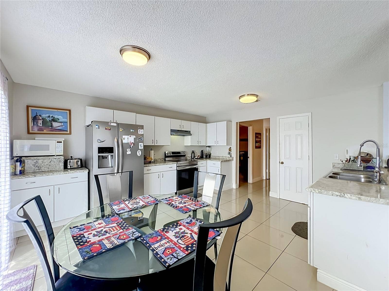 12900 LOS ALAMITOS COURT, Orlando, FL 32837 Dinette area