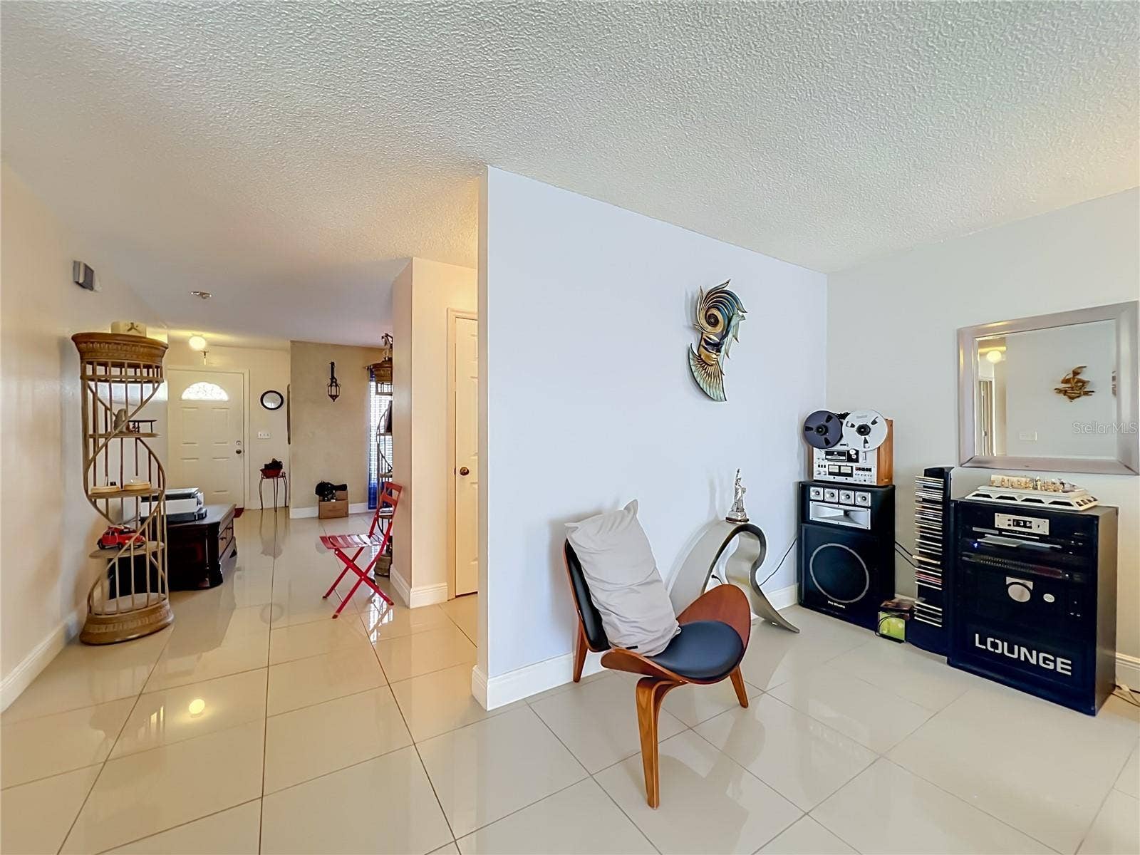 12900 LOS ALAMITOS COURT, Orlando, FL 32837 Large ceramic tile throughout 1st floor