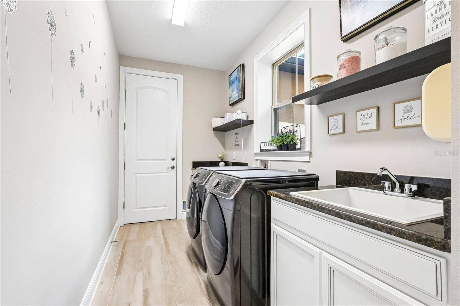 16730 RUSTY ANCHOR ROAD, Winter Garden, FL 34787 Laundry with Entry into Both Garages